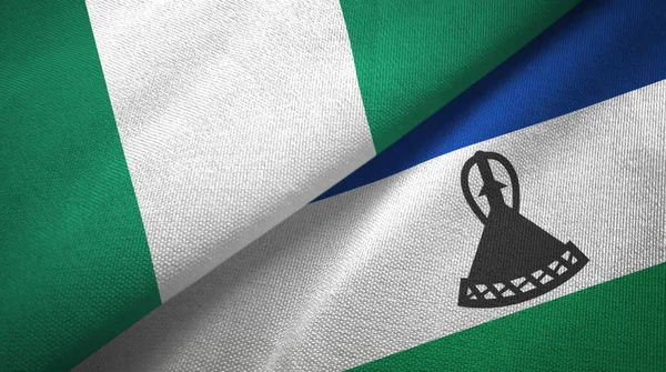 ナイジェリアとレソト2つの旗織物布、生地の質感 — ストック写真