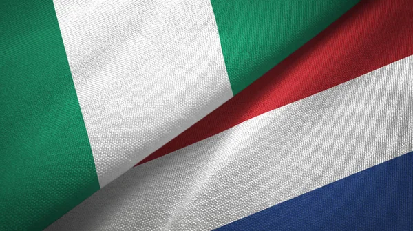 ナイジェリアとオランダ2つの旗織物布、生地の質感 — ストック写真