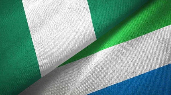 Nigeria and Sierra Leone two flags textile cloth, fabric texture — Stock Photo, Image