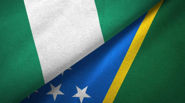 Nigeria and Solomon Islands two flags textile cloth, fabric texture