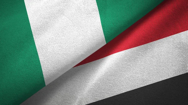 Nijerya ve Yemen iki bayrak tekstil kumaş, kumaş doku — Stok fotoğraf