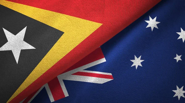 East Timor and Australia two flags textile cloth, fabric texture — Stock Photo, Image