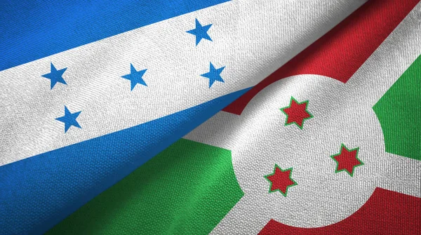 Honduras en Burundi twee vlaggen textiel doek, stof textuur — Stockfoto