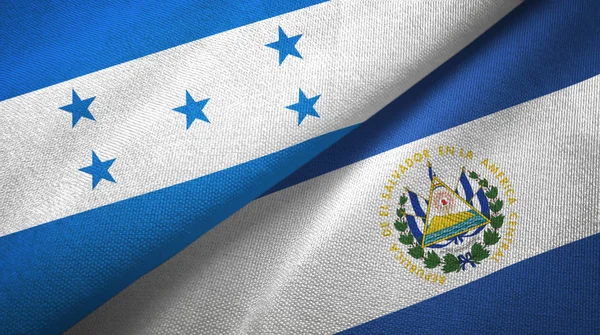 Honduras e El Salvador duas bandeiras de pano têxtil, textura de tecido — Fotografia de Stock