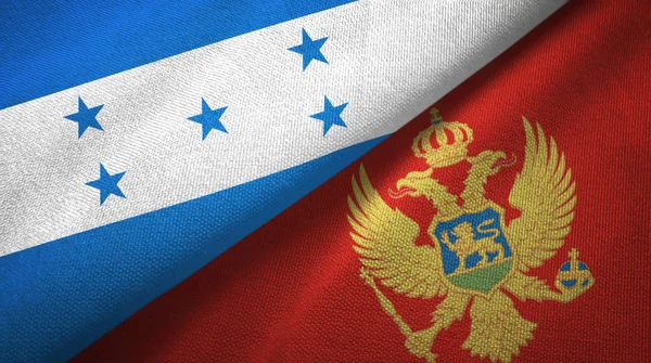 Honduras en Montenegro twee vlaggen textiel doek, weefsel textuur — Stockfoto