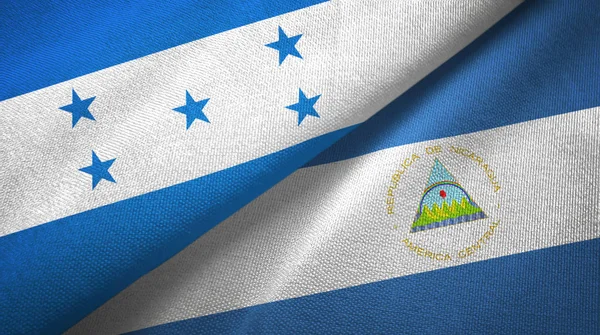 Honduras and Nicaragua two flags textile cloth, fabric texture — Stock Photo, Image