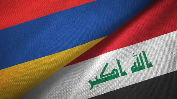 Arménia e Iraque duas bandeiras tecido — Fotografia de Stock