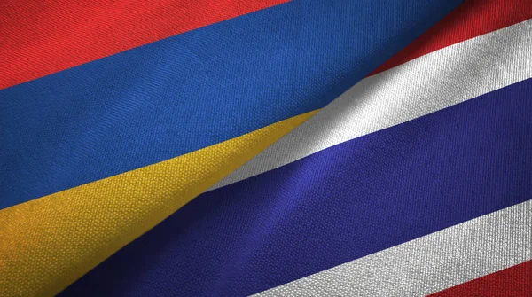 Arménia e Tailândia duas bandeiras de pano têxtil, textura de tecido — Fotografia de Stock