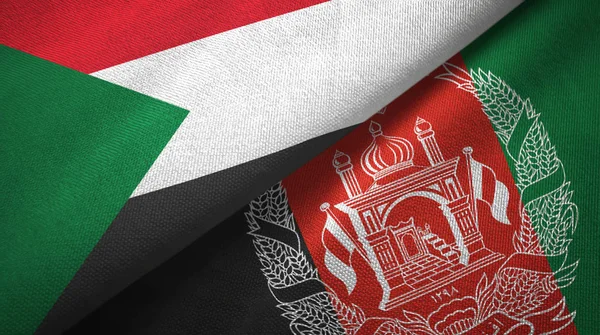 Sudan and Afghanistan two flags textile cloth, fabric texture — Stock Photo, Image