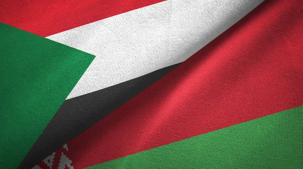 Sudan and Belarus two flags textile cloth, fabric texture — Stock Photo, Image