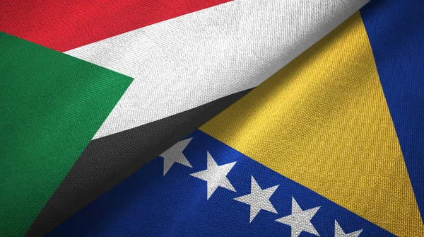 Sudán y Bosnia y Herzegovina dos banderas tela textil, textura de la tela — Foto de Stock