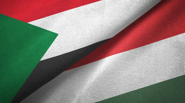Sudan and Hungary two flags textile cloth, fabric texture — Stock Photo, Image
