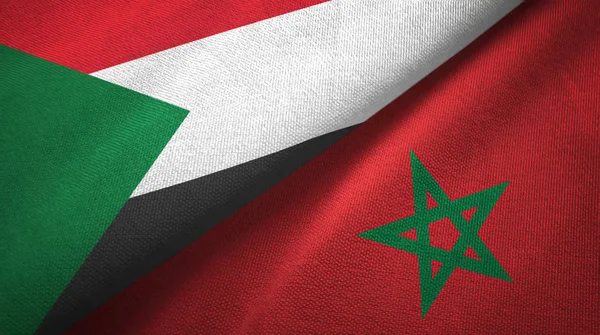 Soedan en Marokko twee vlaggen textiel doek, weefsel textuur — Stockfoto