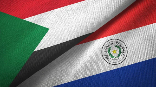 Sudan and Paraguay two flags textile cloth, fabric texture — Stock Photo, Image