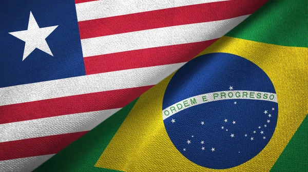 Λιβερία και Βραζιλία δύο σημαίες υφαντό ύφασμα, υφή υφάσματος — Φωτογραφία Αρχείου