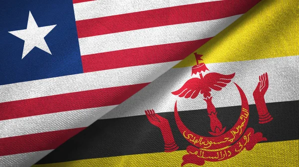 Liberia and Brunei two flags textile cloth — Stock Photo, Image