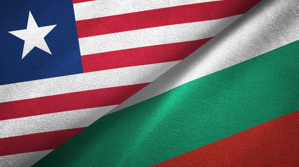 Liberia och Bulgarien två flaggor textil trasa, tyg konsistens — Stockfoto