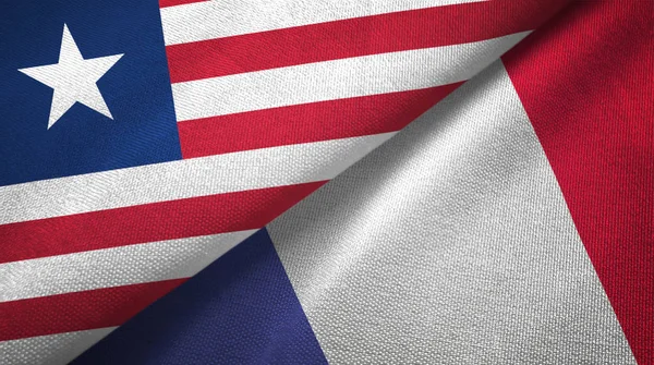 Liberia e Francia due bandiere tessuto, tessitura tessuto — Foto Stock