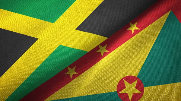 Giamaica e Grenada due bandiere tessuto, tessitura tessuto — Foto Stock
