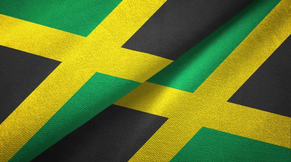 Giamaica due bandiere tessuto, tessitura tessuto — Foto Stock