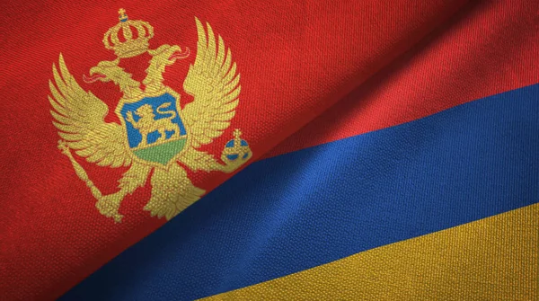 Montenegro y Armenia dos banderas tela textil, textura de la tela —  Fotos de Stock