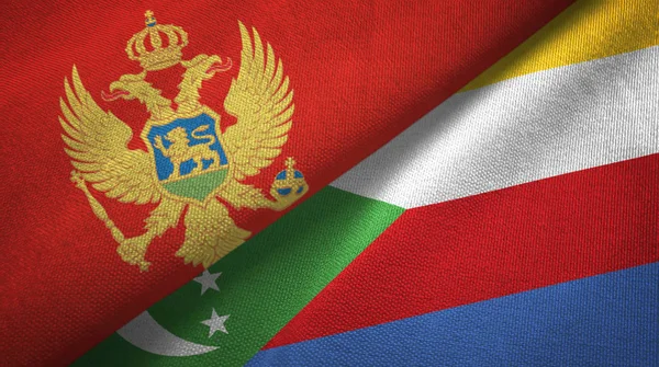 Montenegro och Komorerna två flaggor textil tyg, tyg konsistens — Stockfoto