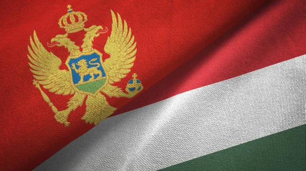 Montenegro and Hungary two flags textile cloth, fabric texture