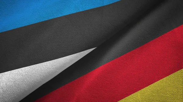 Estonia e Germania due bandiere tessuto, tessitura tessuto — Foto Stock