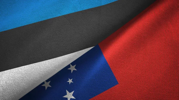 Estonia y Samoa dos banderas tela textil, textura de la tela — Foto de Stock