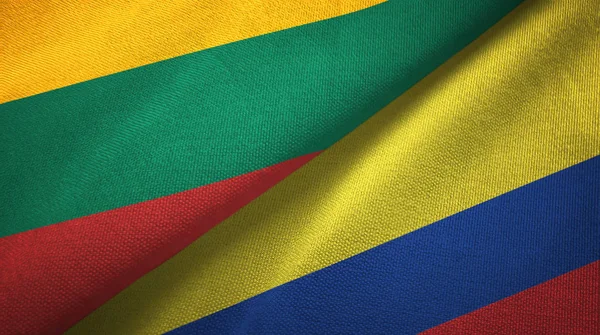 Litvánia és Kolumbia két zászlókat textil ruhával, szövet textúra — Stock Fotó