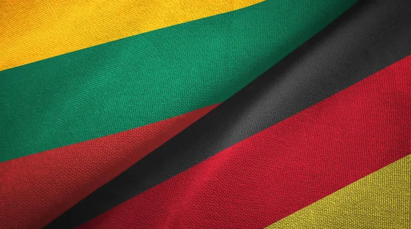 Lituania e Germania due bandiere tessuto, tessitura tessuto — Foto Stock