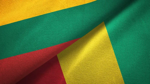 Lithuania and Guinea two flags textile cloth, fabric texture — Stock Photo, Image