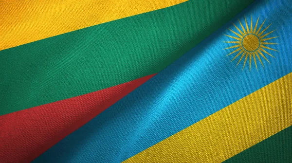 Litouwen en Rwanda twee vlaggen textiel doek, weefsel textuur — Stockfoto