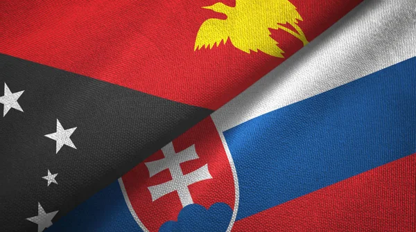 Papoea-Nieuw-Guinea en Slowakije twee vlaggen textiel doek, stof textuur — Stockfoto