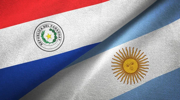 Paraguay and Argentina two flags textile cloth, fabric texture — Stock Photo, Image