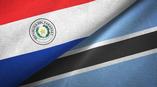 Paraguay and Botswana two flags textile cloth, fabric texture — Stock Photo, Image