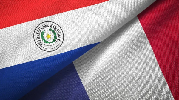 Paraguay and France two flags textile cloth, fabric texture — Stock Photo, Image