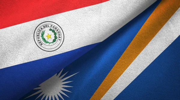 Paraguay e Islas Marshall dos banderas tela textil, textura de la tela — Foto de Stock