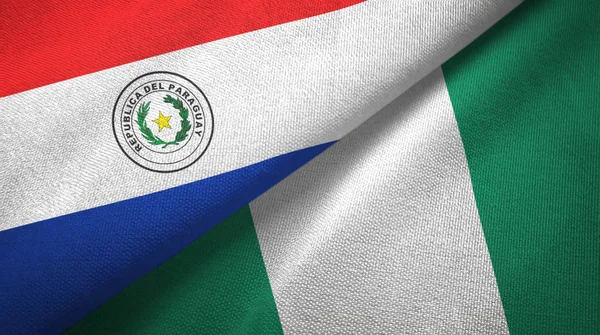 Paraguay and Nigeria two flags textile cloth, fabric texture — Stock Photo, Image