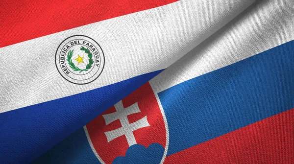 Paraguay dan Slowakia dua bendera kain tekstil, tekstur kain — Stok Foto