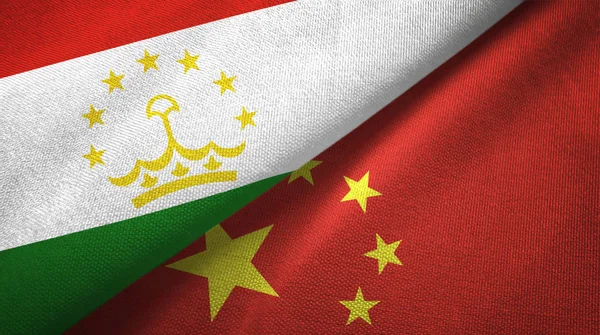 Tajikistan and China two flags textile cloth, fabric texture — Stock Photo, Image