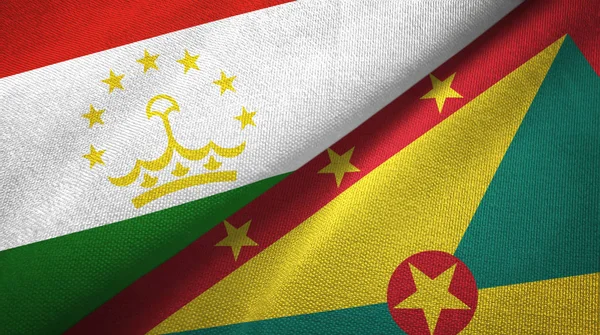 Tayikistán y Granada dos banderas tela textil, textura de la tela — Foto de Stock