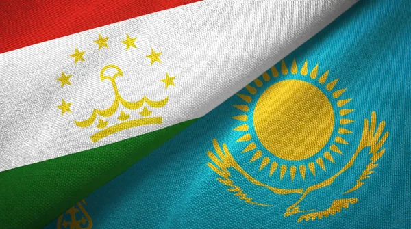 Tajikistan and Kazakhstan two flags textile cloth, fabric texture
