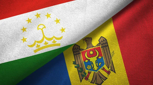 Tayikistán y Moldavia dos banderas tela textil, textura de la tela — Foto de Stock