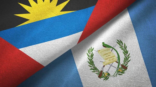 Antigua-et-Barbuda et Guatemala deux drapeaux tissu textile, texture du tissu — Photo
