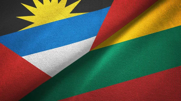 Antigua y Barbuda y Lituania dos banderas tela textil, textura de la tela — Foto de Stock