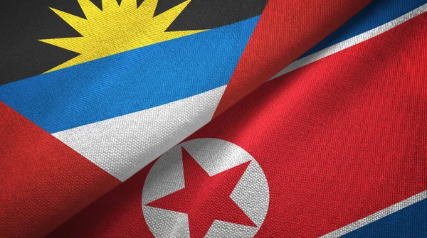 Antigua and Barbuda and North Korea two flags textile cloth, fabric texture — Stock Photo, Image