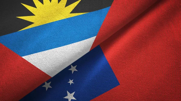 Antigua y Barbuda y Samoa dos banderas tela textil, textura de la tela — Foto de Stock
