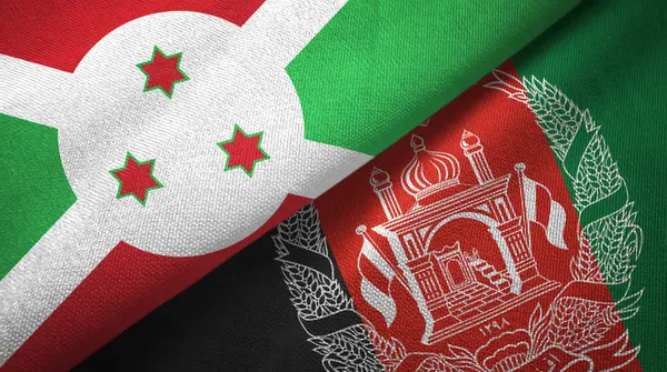 Burundi y Afganistán dos banderas tela textil, textura de la tela — Foto de Stock