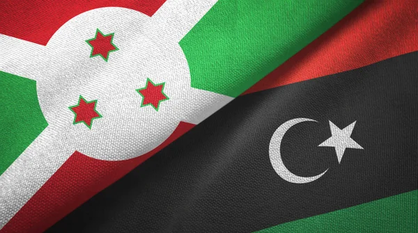 Burundi e Libia due bandiere tessuto, tessitura tessuto — Foto Stock